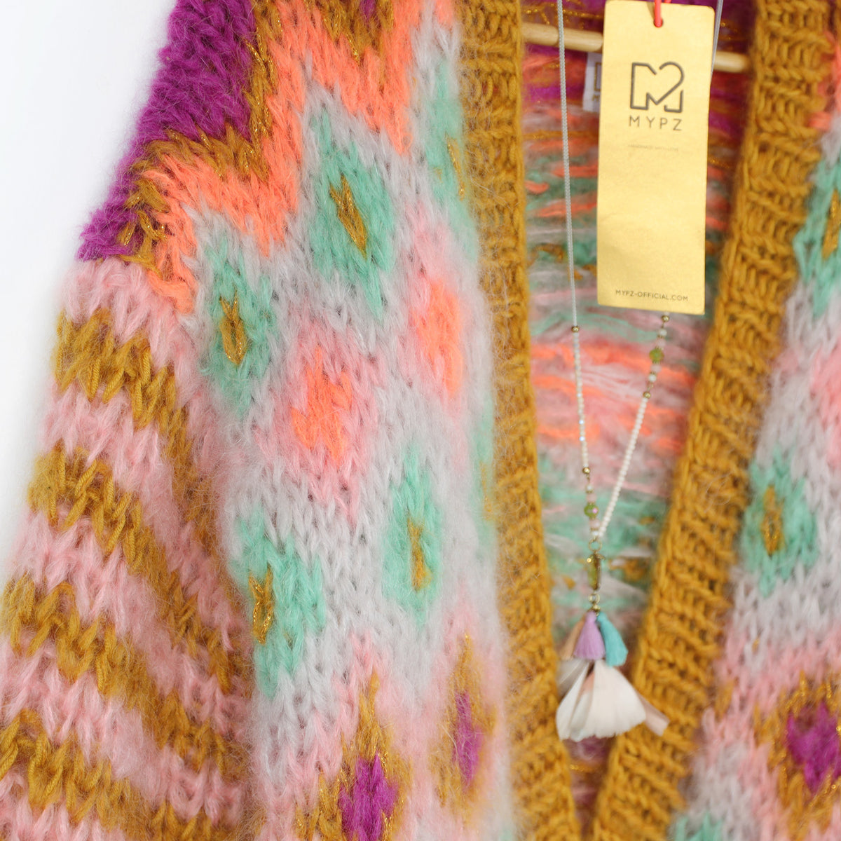 Breipatroon - Chunky Mohair-jas Flora nr.12 (ENG-DE-NL-ES-FR-IT-DA-SV-NO)